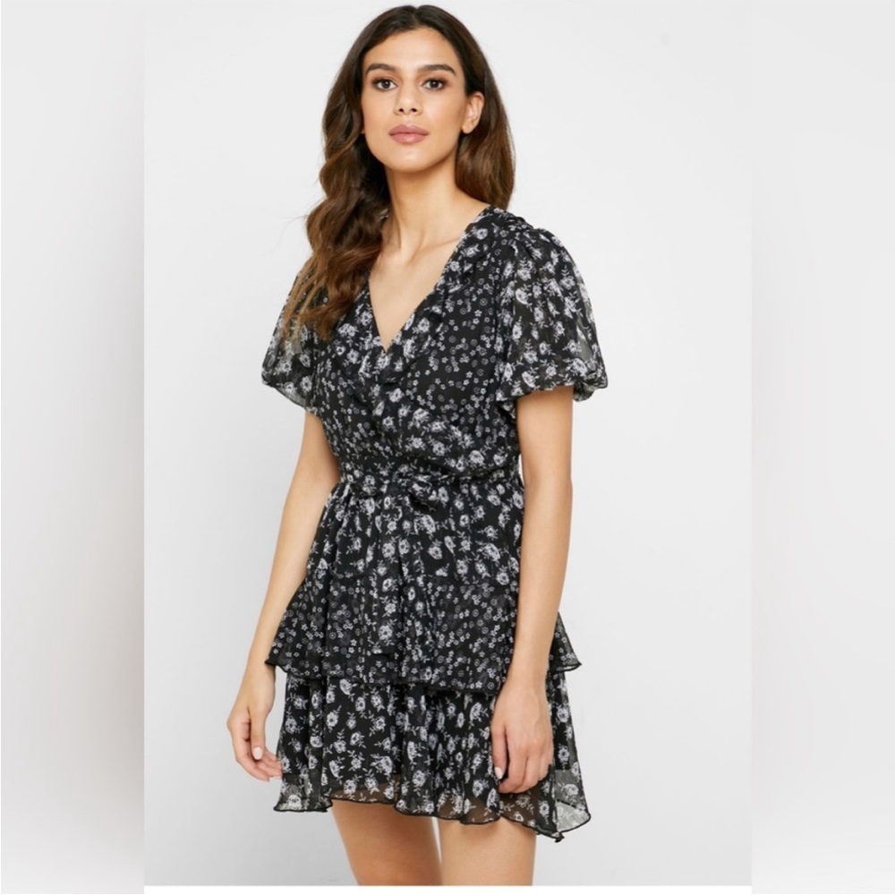 Black Floral Puff Sleeve Wrap Mini
Dress with Semi Sheer Back. Size 6.